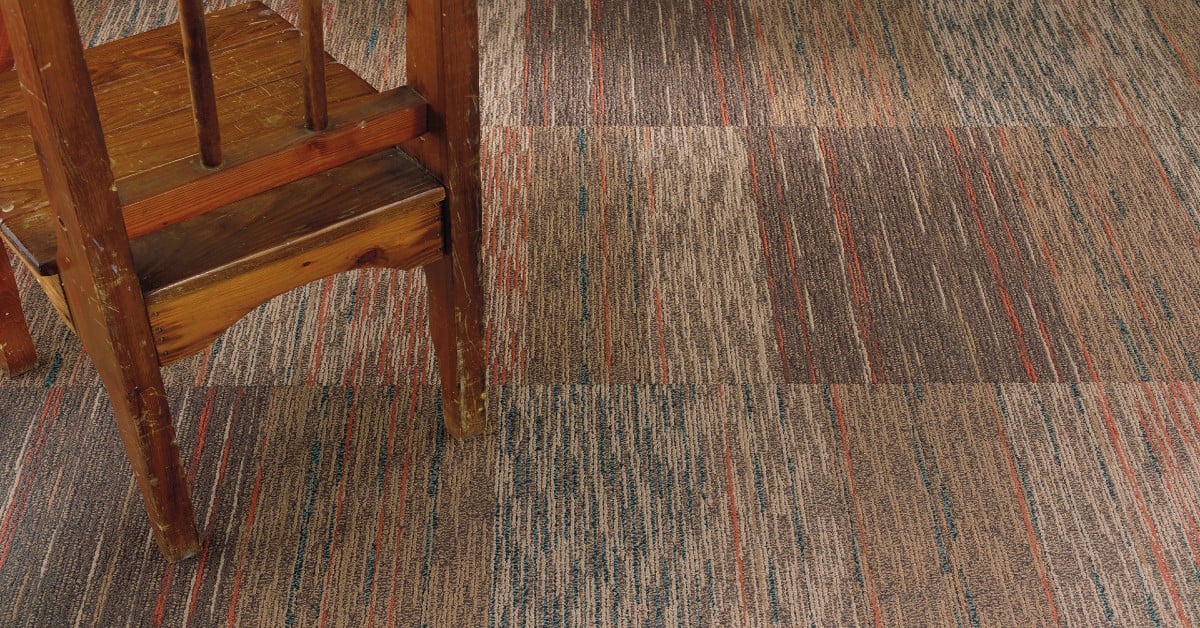 Modern office space with high performance carpet tiles featuring diverse patterns and colors for a professional look